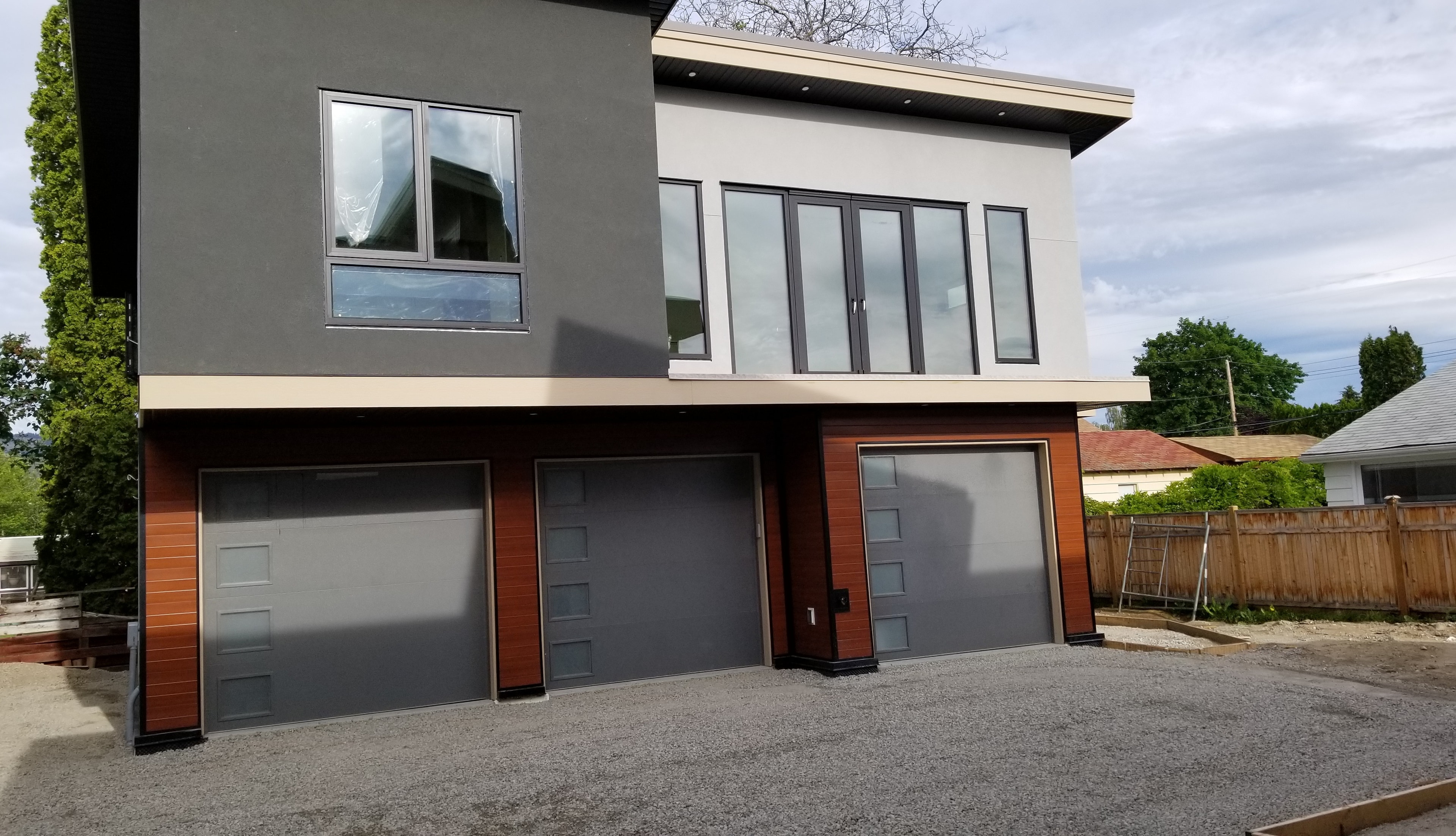 Trout Creek Residence — garage and lower exterior with cedar cladding