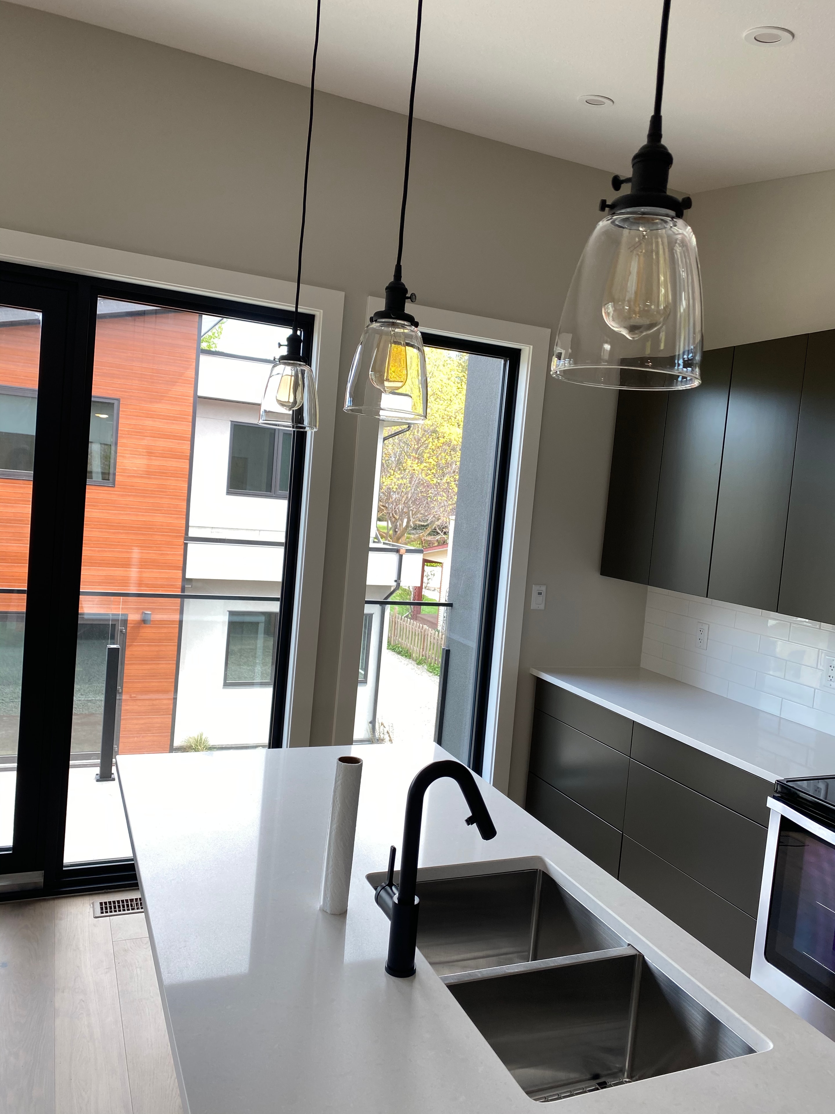 Trout Creek Residence — kitchen and dining with large windows